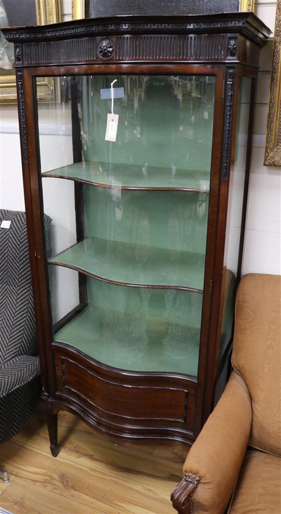 An Edwardian carved mahogany serpentine glazed display cabinet W.73cm